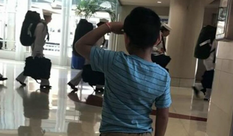A kid who saluted the military goes viral on social media.